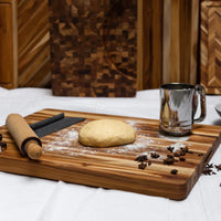 Teakhaus 24" x 18" x 1.5" Traditional Teakwood Cutting Board with Handgrips